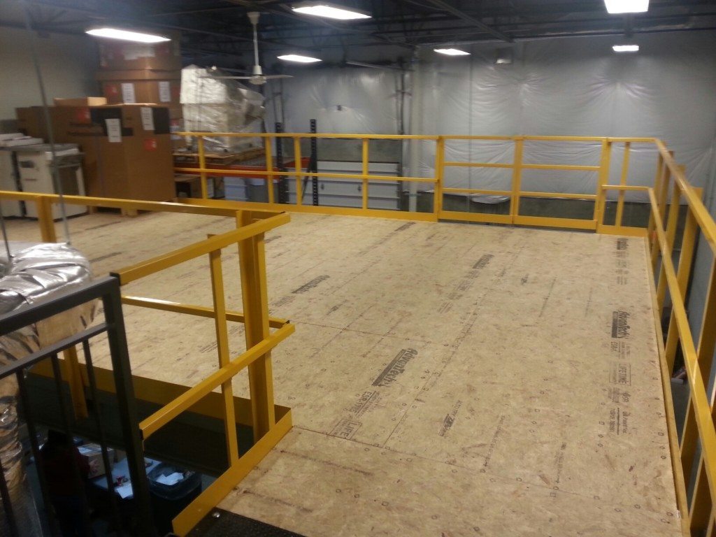 Advantech mezzanine decking with yellow safety railings