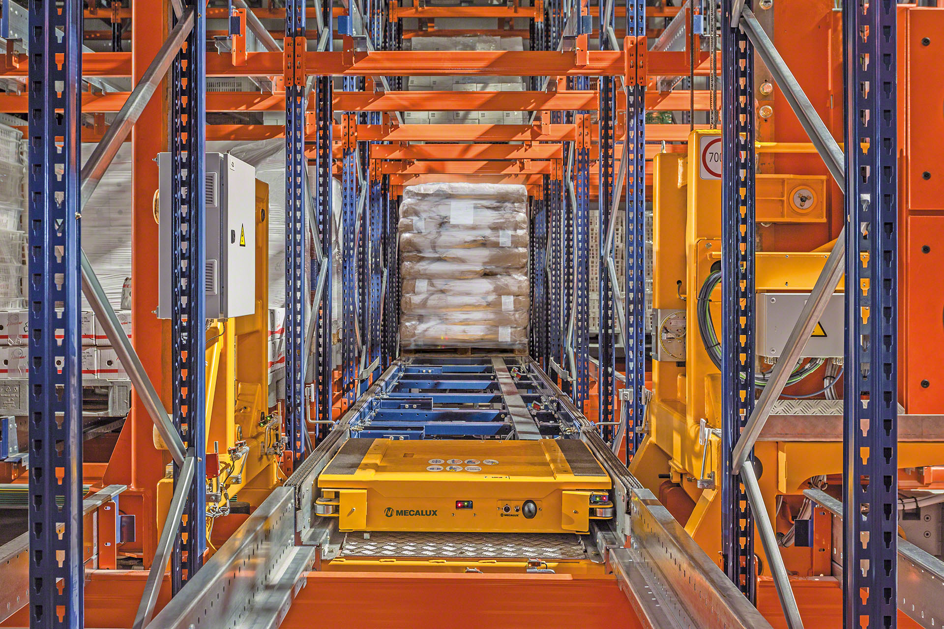 AS/RS storage channels with automated pallet shuttle for high-density storage