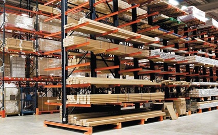 Heavy-duty cantilever pallet rack system storing lumber and wood products