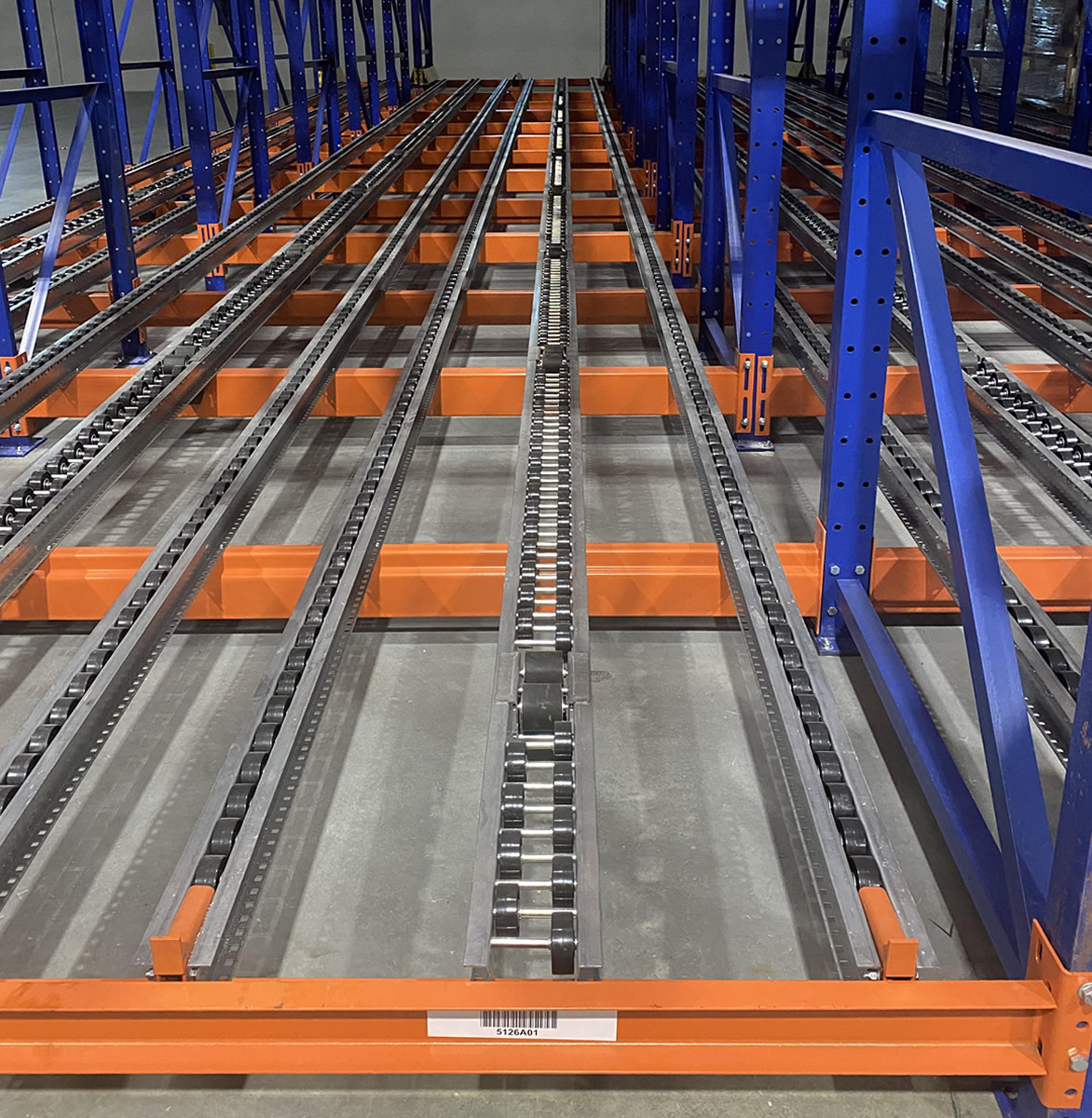 Gravity fed pallet flow racking in Charlotte warehouse